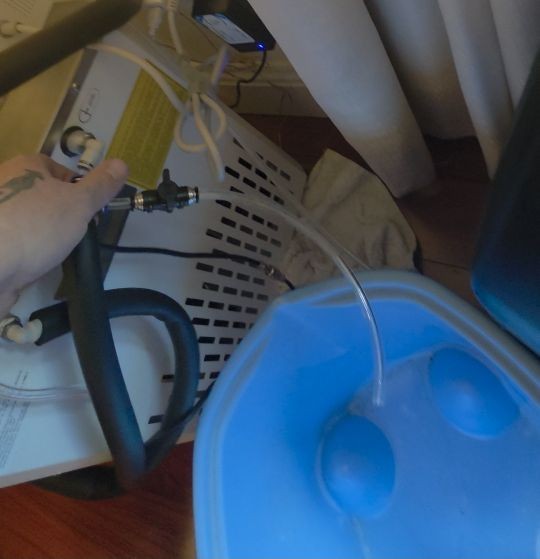 AC Maintenance Kit service valve draining a chiller into a bucket