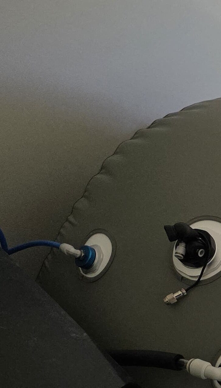 Close view of a soft-shell chamber’s fabric and external connection points