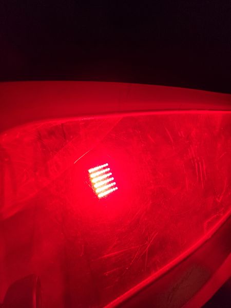 Soft Shell Red Light Panel glowing through the chamber window at night